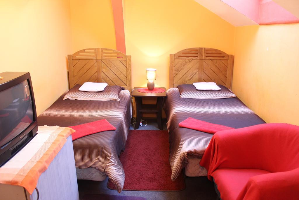 Auberge de jeunesse Pokoje Na Chmielnej 2 à Varsovie Chambre photo